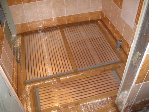 Фото: теплый электрический пол в ванной